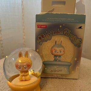 Pop Mart Labubu big into energy light up snow globe